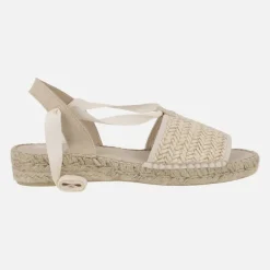 Alpargatas bajas en rafia trenzada beige con cintas