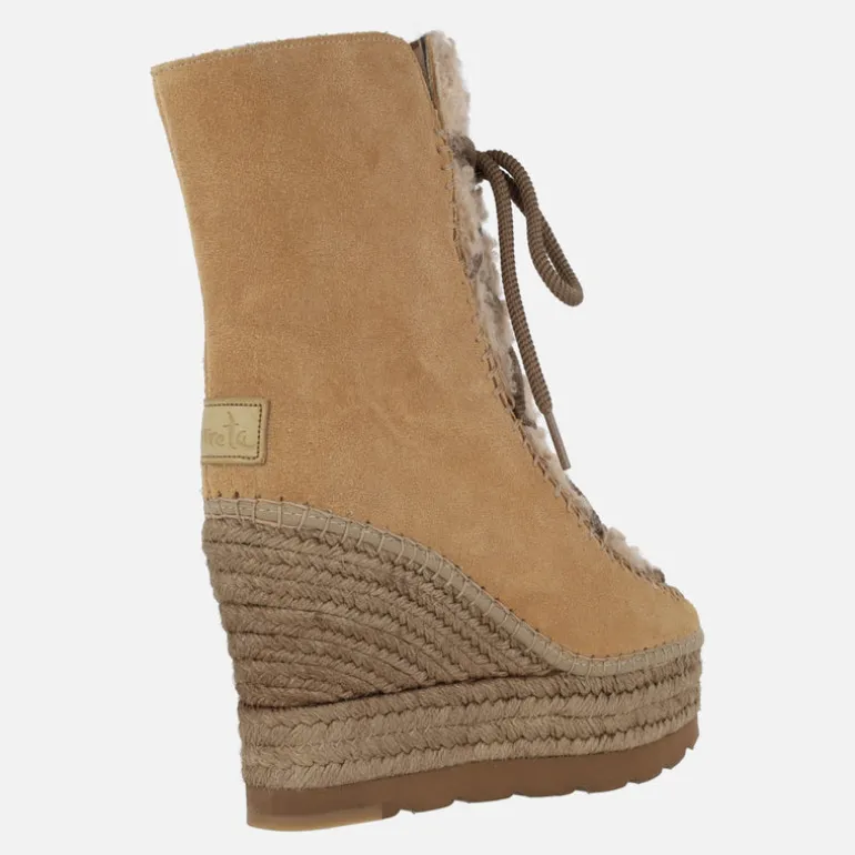 Botas de ante estilo esquimal con pala de borreguillo y cuña alta de yute