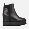 Botines Alpe Vanity en piel negra con cuña interior