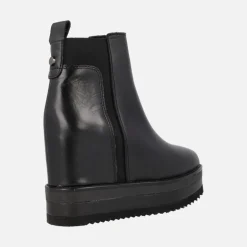 Botines Alpe Vanity en piel negra con cuña interior