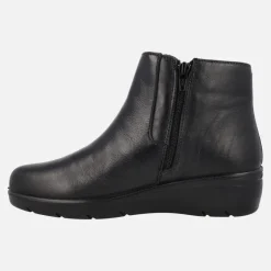 Botines confort en piel con detalle de elásticos cruzados