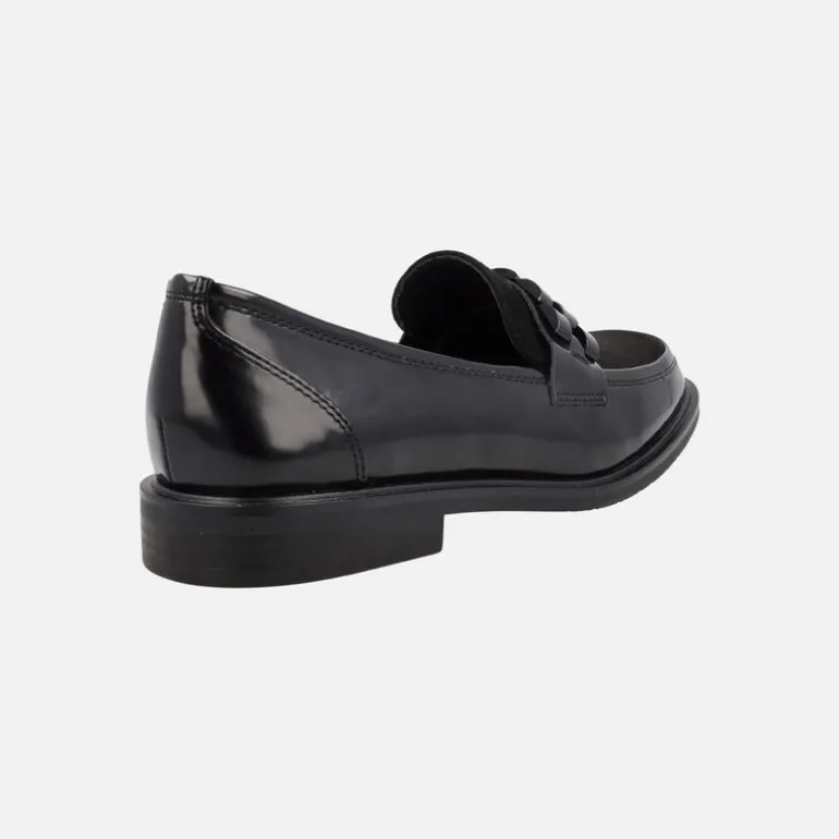 Mocasines negros multimaterial con adorno en la pala