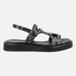 Sandalias negras de piel con tachas metálicas doradas