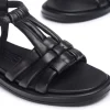 Sandalias planas de piel con tiras entrelazadas
