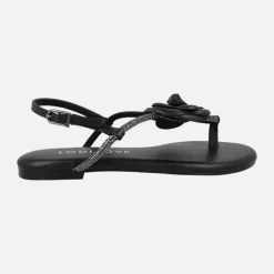 Sandalias planas negras de piel con adorno de flor y strass