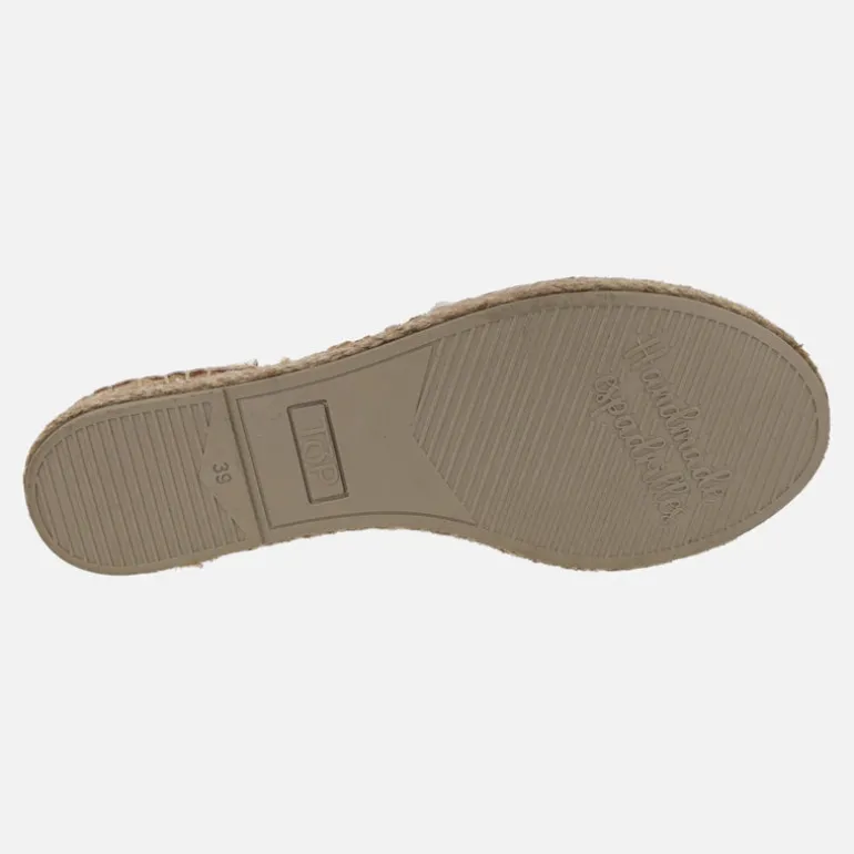 Zapatillas de esparto con dibujos troquelados en la pala y elásticos