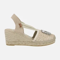 Zapatillas de esparto en rafia brillo crudo con adorno joya