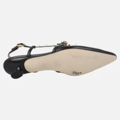 Zapatos de piel destalonados con corte salón y tachas