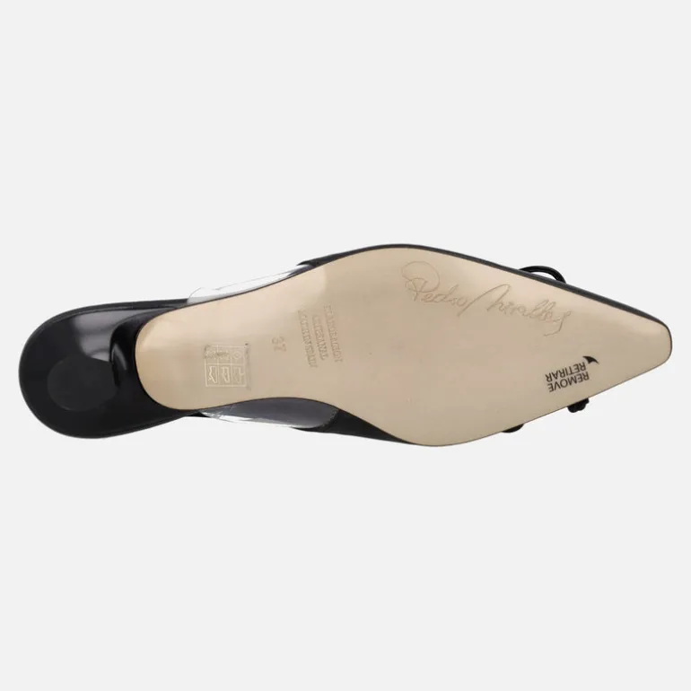 Zapatos de piel destalonados con adorno de lazo