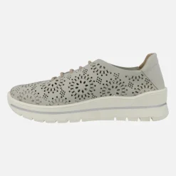 Zapatos deportivos con dibujos troquelados y cierre de cordones