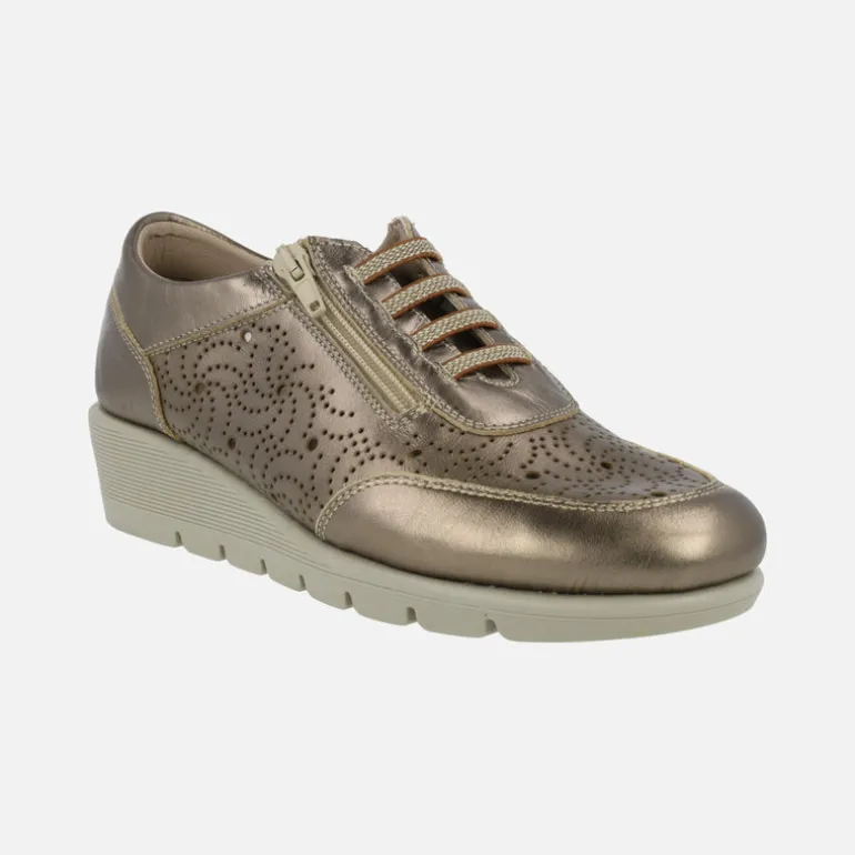 Zapatos deportivos de piel con dibujos troquelados