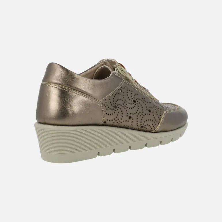 Zapatos deportivos de piel con dibujos troquelados