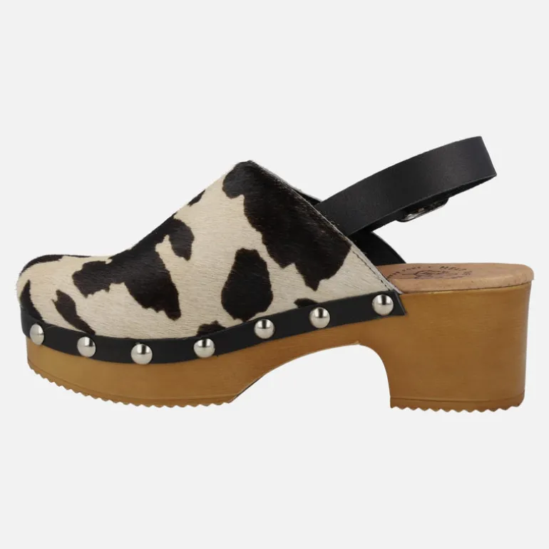 Zuecos en pelo animal print con tira al talón